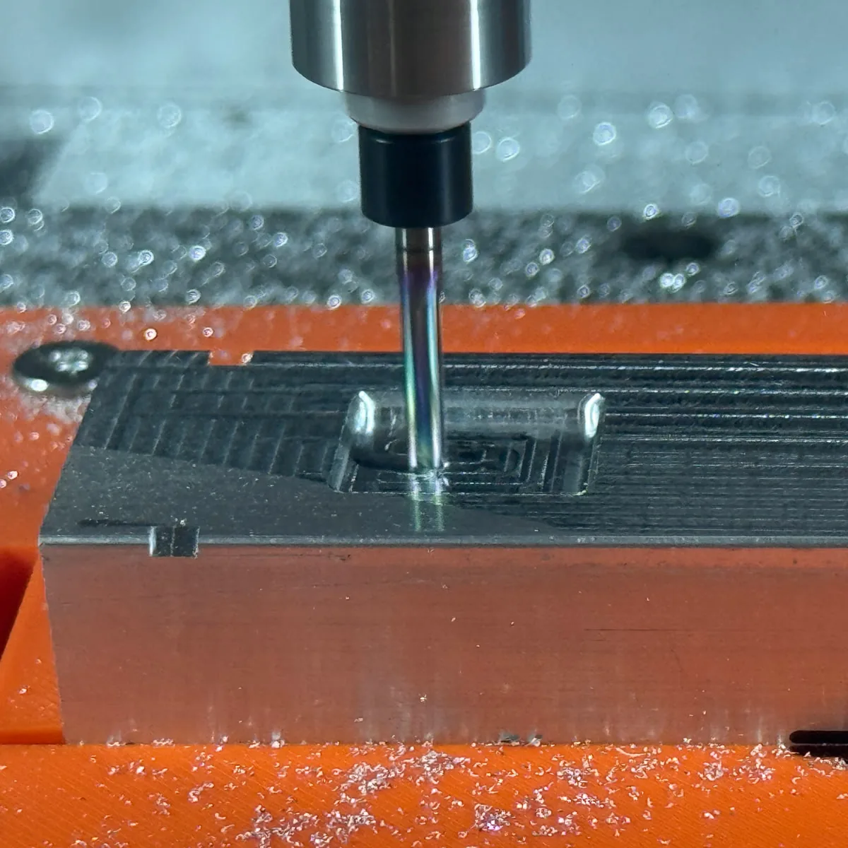End mill cutting a pocket in an aluminum part on the CNC mill at Shibui Tech, Bloomington Indiana